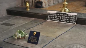 Photo of Shakespeare's Grave. Features as the final photo in this short biography about william shakespeare.