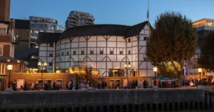 Globe Theatre taken at night from the Thames river. Features as the third photo in this short biography about william shakespeare.